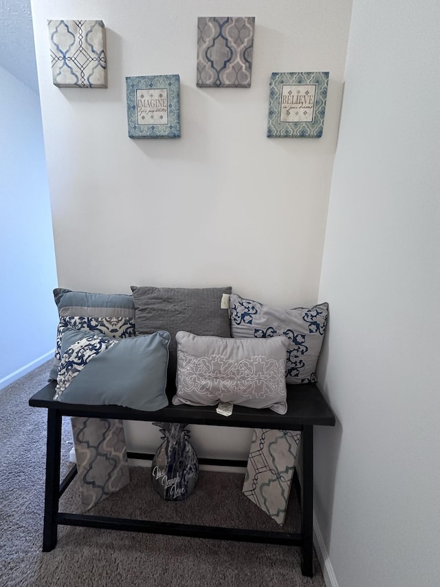 living room with carpet flooring and baseboards