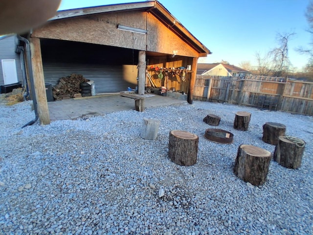 exterior space featuring fence and a patio