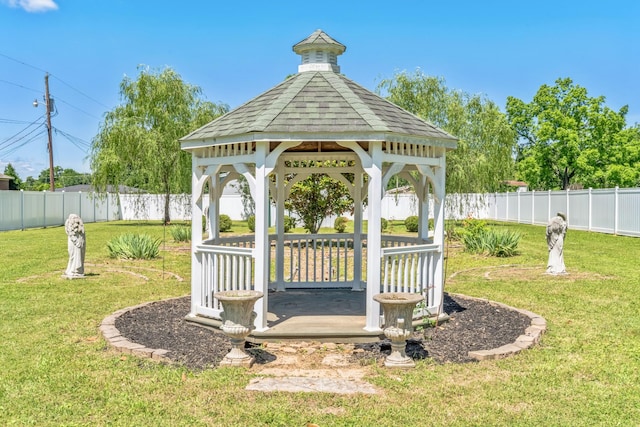 view of yard with a fenced backyard and a gazebo