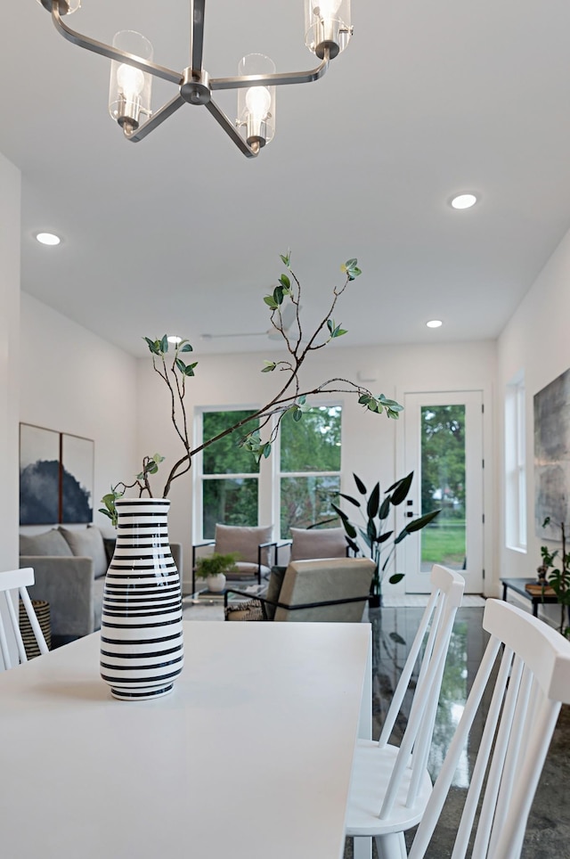 dining area with a wealth of natural light and recessed lighting