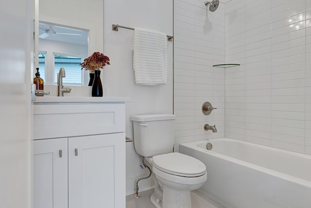 full bath with shower / tub combination, vanity, and toilet