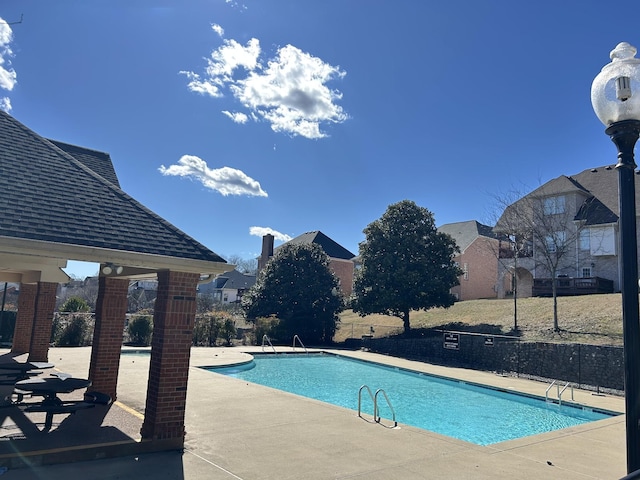 community pool featuring a patio