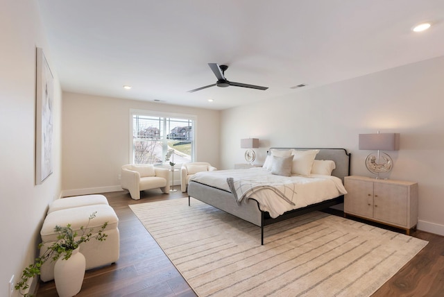 bedroom featuring recessed lighting, baseboards, and wood finished floors