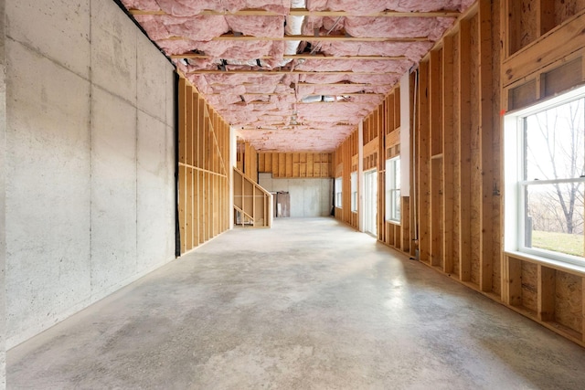 miscellaneous room featuring unfinished concrete floors