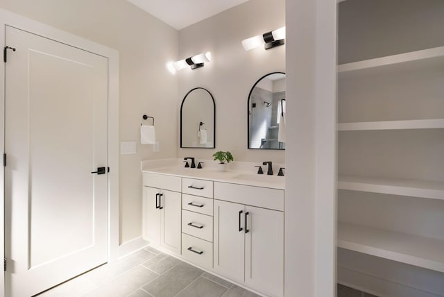 full bath with double vanity and a sink