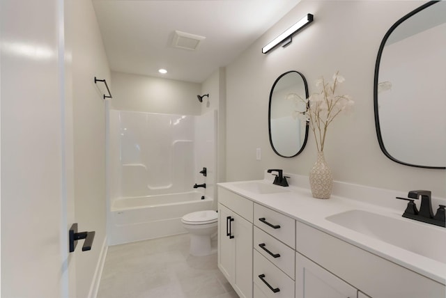 bathroom featuring double vanity, shower / tub combination, a sink, and toilet