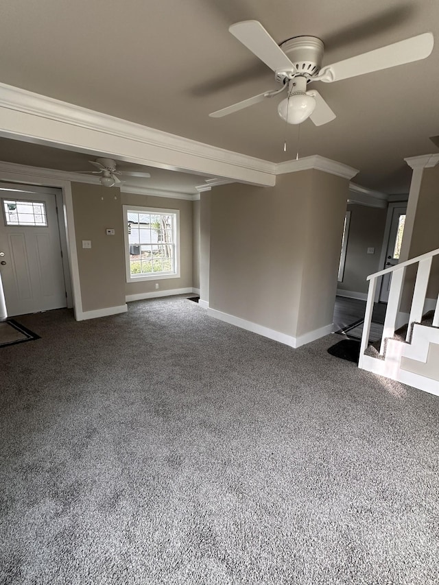 unfurnished living room featuring a ceiling fan, baseboards, dark carpet, and ornamental molding