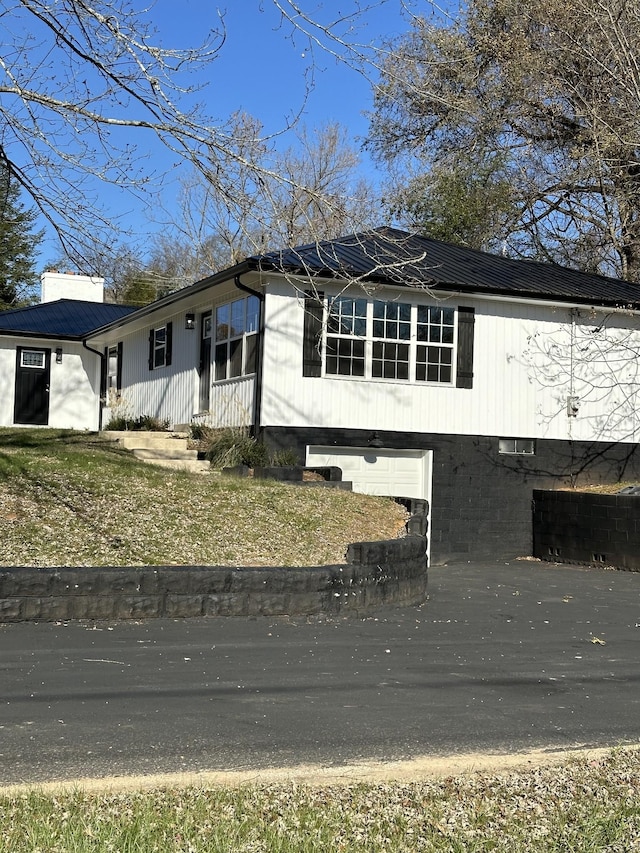 view of front of house featuring an attached garage