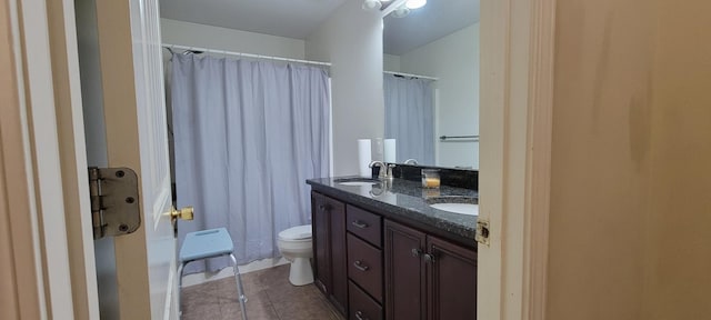 full bathroom featuring a shower with curtain, double vanity, toilet, a sink, and tile patterned flooring