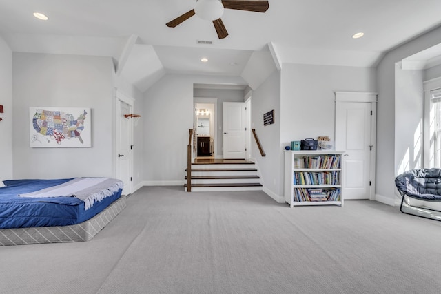 carpeted bedroom with baseboards, visible vents, vaulted ceiling, and recessed lighting