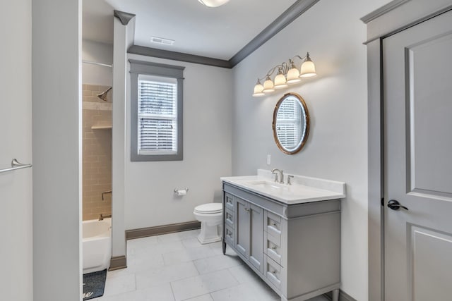 full bath with shower / bath combination, baseboards, visible vents, toilet, and vanity