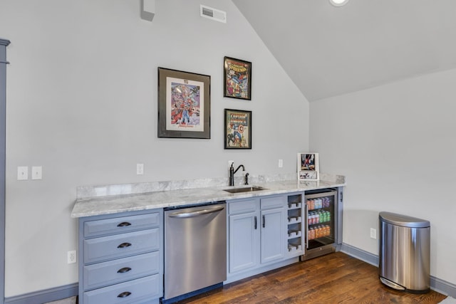 bar with wine cooler, visible vents, vaulted ceiling, a sink, and dishwasher