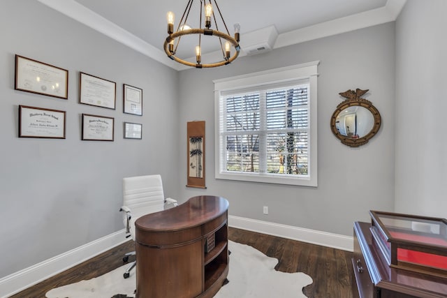 office with a notable chandelier, wood finished floors, and baseboards