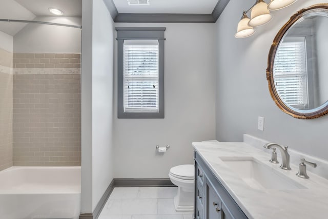 full bath with shower / bathtub combination, toilet, ornamental molding, vanity, and baseboards