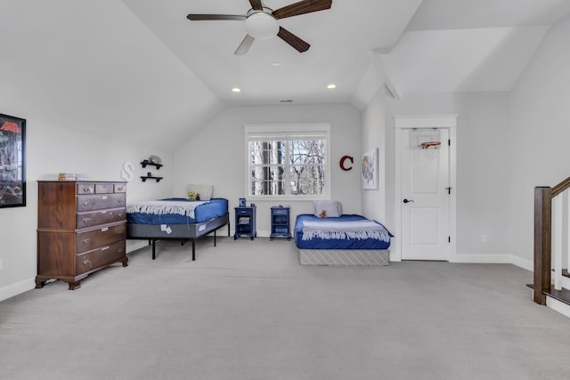 bedroom featuring lofted ceiling, carpet flooring, and baseboards