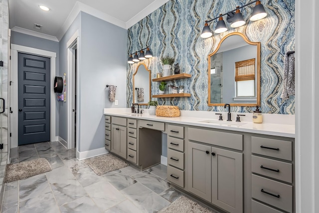 bathroom with a sink, baseboards, marble finish floor, ornamental molding, and wallpapered walls