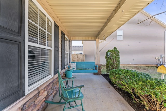 view of patio featuring covered porch