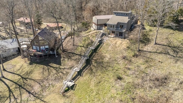 aerial view with a wooded view