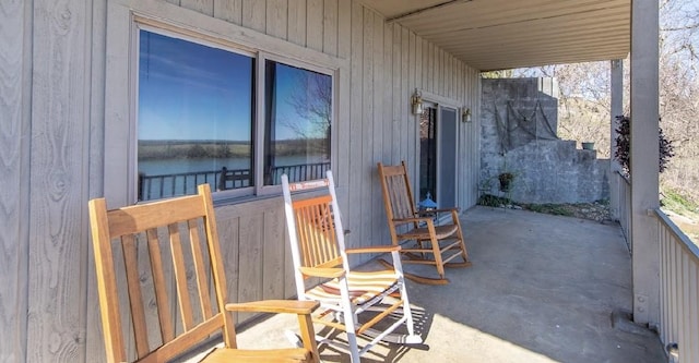 view of patio / terrace with a water view