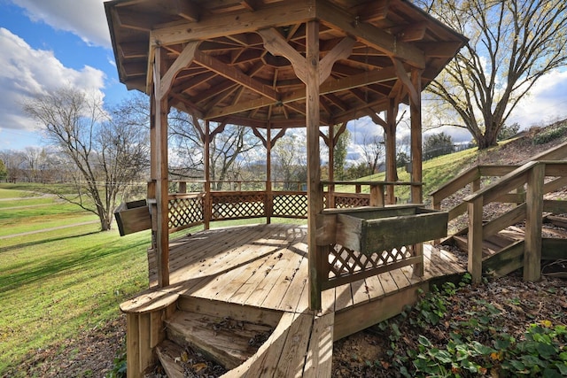 deck featuring a yard and a gazebo