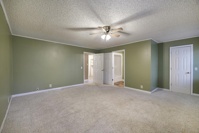 unfurnished bedroom featuring ornamental molding, light carpet, and baseboards