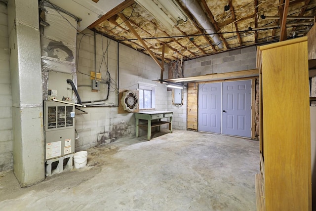 basement featuring concrete block wall