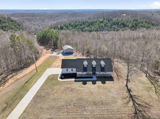 drone / aerial view with a forest view