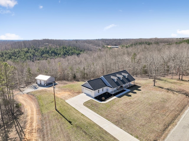 aerial view featuring a rural view and a forest view