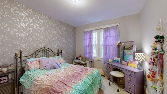 bedroom with carpet and wallpapered walls