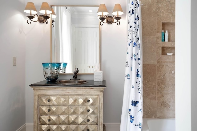 bathroom featuring shower / bath combo and vanity