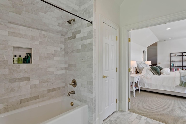 bathroom with ensuite bathroom, marble finish floor, tub / shower combination, and recessed lighting