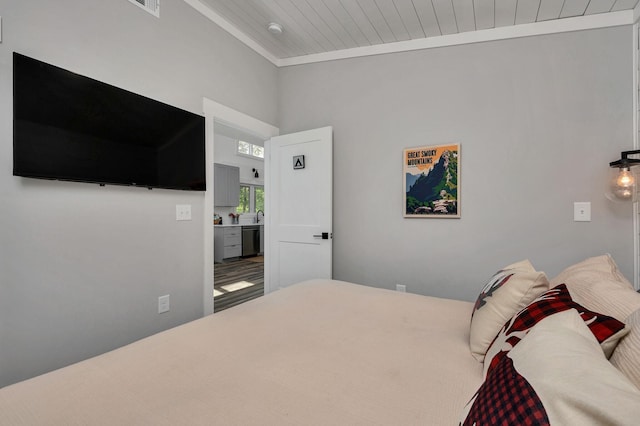 bedroom with wooden ceiling and crown molding