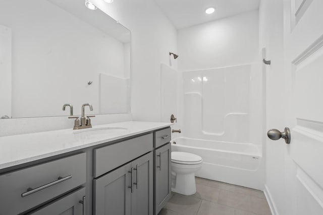 full bathroom with recessed lighting, bathtub / shower combination, toilet, vanity, and tile patterned flooring