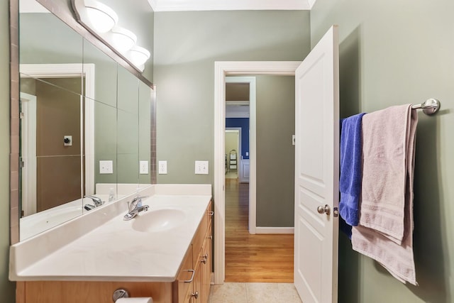 bathroom featuring vanity and baseboards