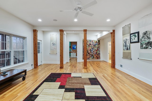 workout room with baseboards, visible vents, wood finished floors, and recessed lighting