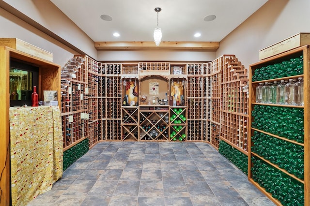 wine cellar with recessed lighting and stone finish floor