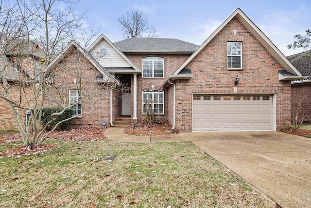 traditional-style house with driveway, a shingled roof, a front lawn, and brick siding