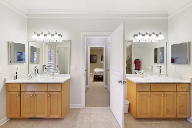 full bath featuring ornamental molding, a sink, and ensuite bathroom