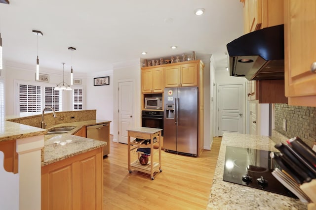 kitchen with ornamental molding, under cabinet range hood, light brown cabinetry, black appliances, and a sink