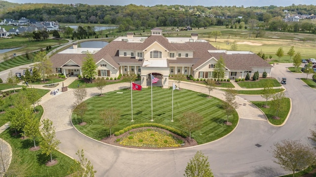 bird's eye view featuring a residential view and a water view