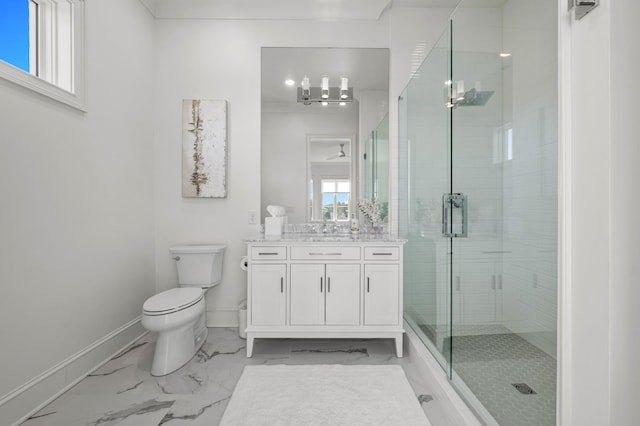 full bathroom with marble finish floor, a shower stall, toilet, and baseboards