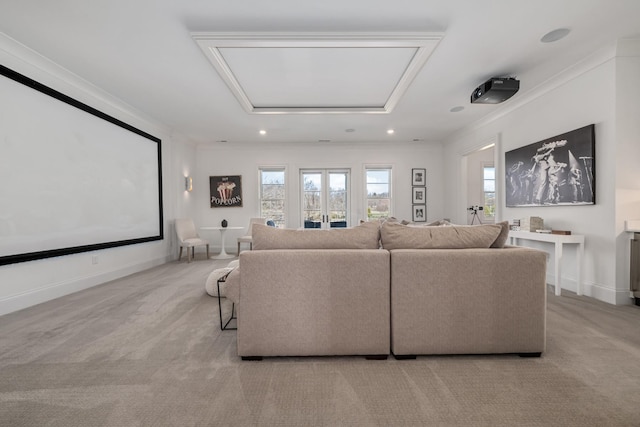 home theater with recessed lighting, baseboards, french doors, and light colored carpet