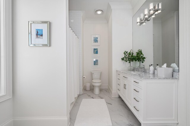 bathroom with marble finish floor, toilet, ornamental molding, vanity, and baseboards