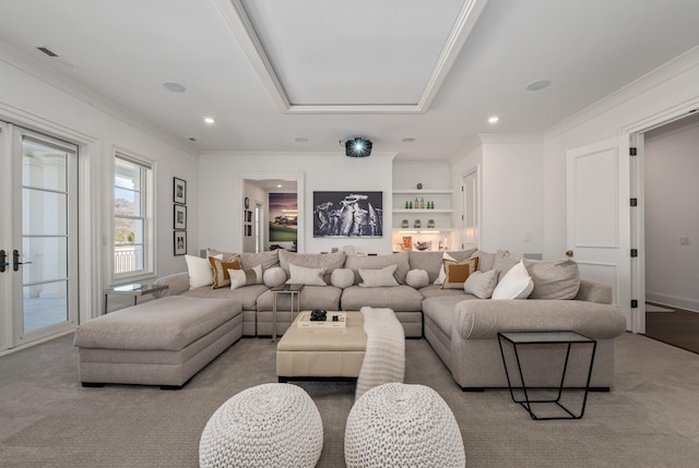 living room with crown molding and recessed lighting