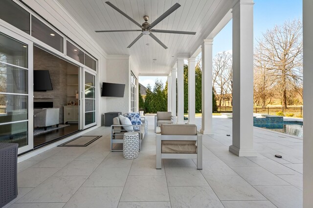 view of patio with ceiling fan, outdoor lounge area, and a fenced in pool