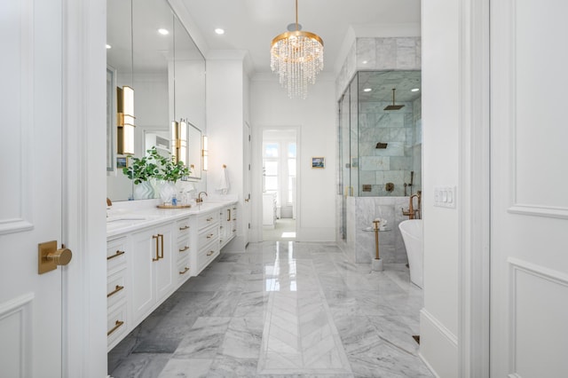 bathroom with a notable chandelier, marble finish floor, double vanity, a stall shower, and crown molding