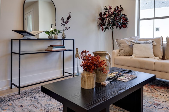 living room featuring baseboards