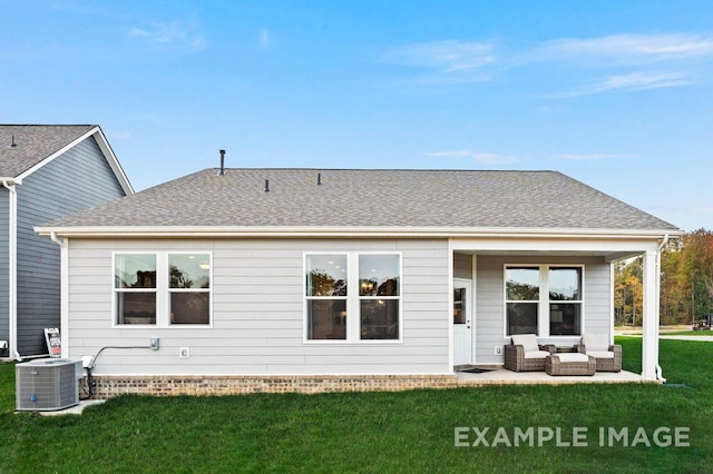 rear view of property featuring central air condition unit, an outdoor hangout area, a shingled roof, a yard, and a patio area