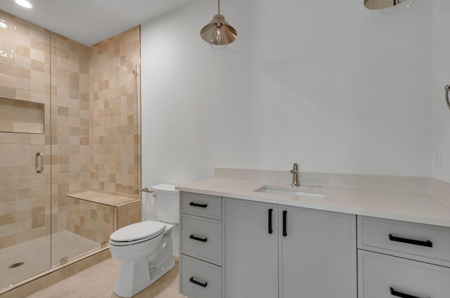 full bathroom with toilet, a stall shower, tile patterned flooring, and vanity