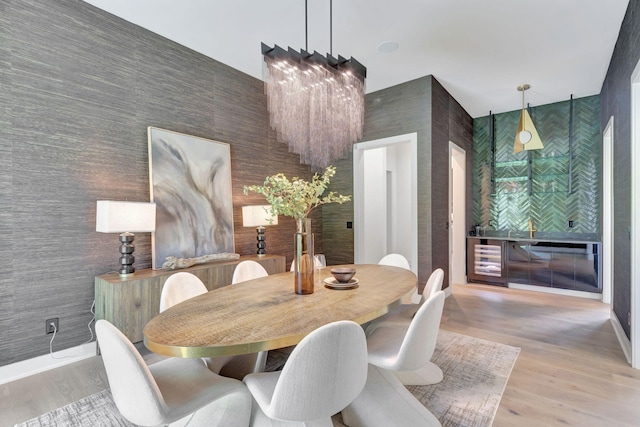 dining area with wood finished floors